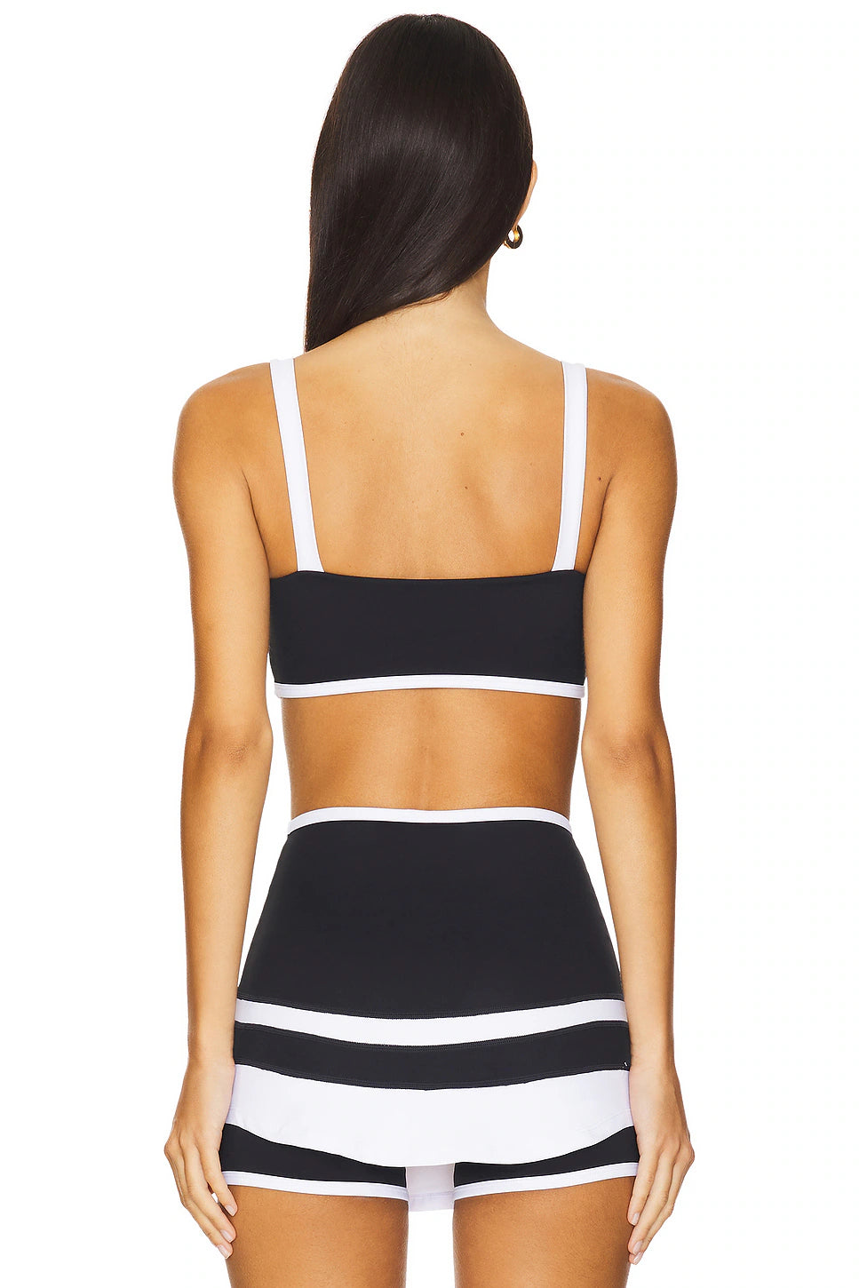 Nubyen Optimist Contrast Bra Top: Premium activewear top featuring a supportive fit, striking contrast design, and breathable fabric. Perfect for workouts, yoga, or athleisure, blending comfort and style to empower your active lifestyle.
