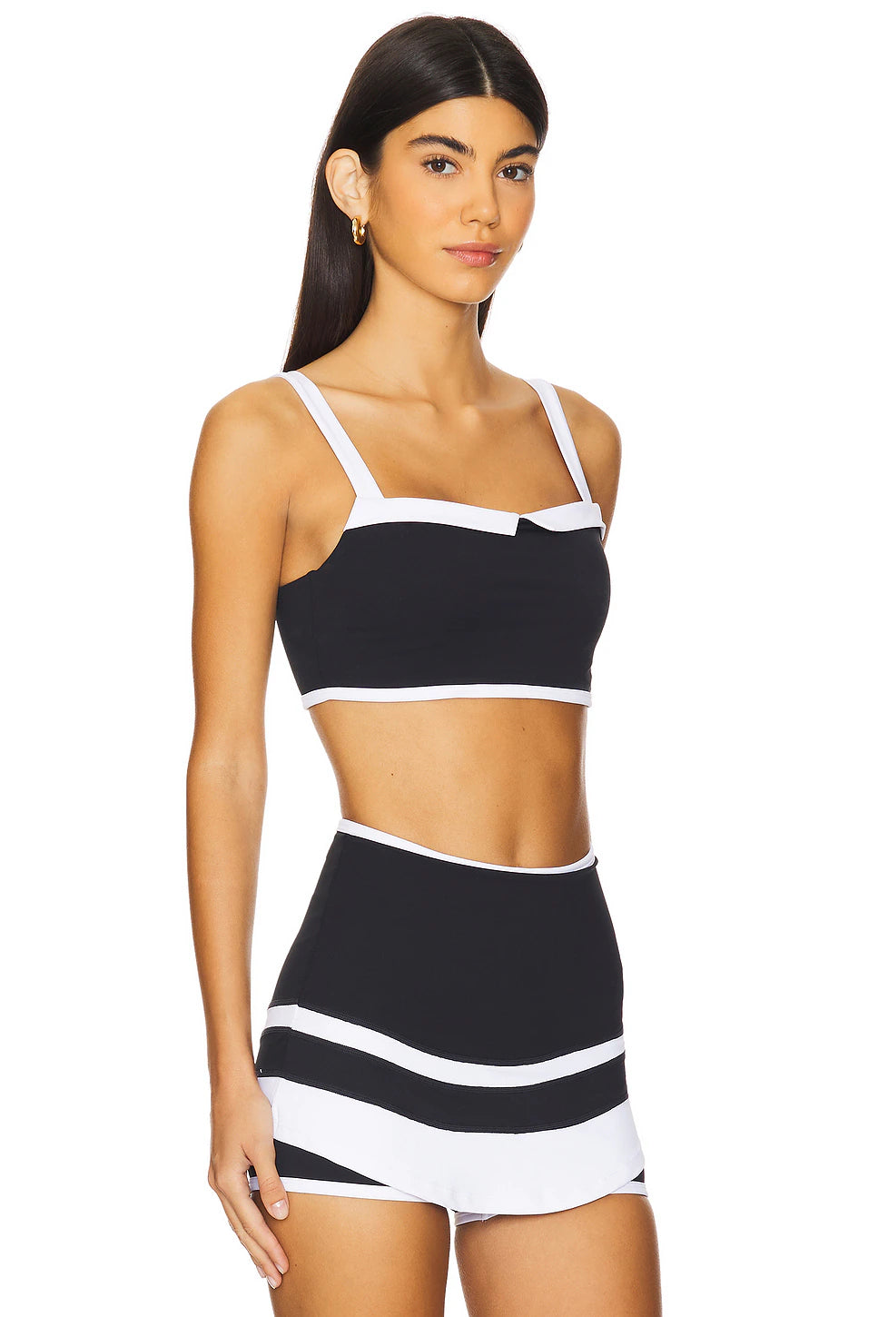 Nubyen Optimist Contrast Bra Top: Premium activewear top featuring a supportive fit, striking contrast design, and breathable fabric. Perfect for workouts, yoga, or athleisure, blending comfort and style to empower your active lifestyle.