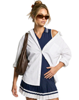 The Nubyen Prosperity Pleated Tennis Dress is a luxury women’s tennis dress designed with a sculpting silhouette, elegant pleated detailing, and elevated performance fabric for refined movement on and off the court. Inspired by contemporary racket sports fashion and minimalist athletic styling, this premium activewear piece blends modern femininity with functional comfort. The streamlined fit enhances confidence and flexibility, making it ideal for tennis, padel, wellness lifestyles, and luxury everyday spo