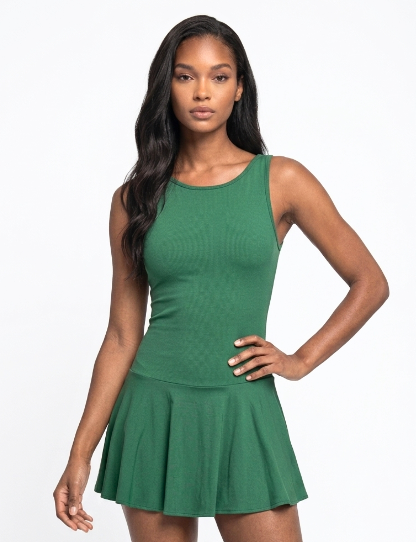 The Nubyen Radiance Flared Tennis Dress is a luxury women’s tennis dress designed with a sculpting fitted bodice, elegant flared skirt silhouette, and premium performance fabric for effortless movement and elevated court style. Inspired by contemporary racket sports fashion and minimalist wellness aesthetics, this modern activewear dress blends feminine tailoring with functional comfort for tennis, padel, pilates, and luxury everyday wear. The streamlined silhouette enhances confidence while delivering refi