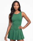 The Nubyen Radiance Flared Tennis Dress is a luxury women’s tennis dress designed with a sculpting fitted bodice, elegant flared skirt silhouette, and premium performance fabric for effortless movement and elevated court style. Inspired by contemporary racket sports fashion and minimalist wellness aesthetics, this modern activewear dress blends feminine tailoring with functional comfort for tennis, padel, pilates, and luxury everyday wear. The streamlined silhouette enhances confidence while delivering refi