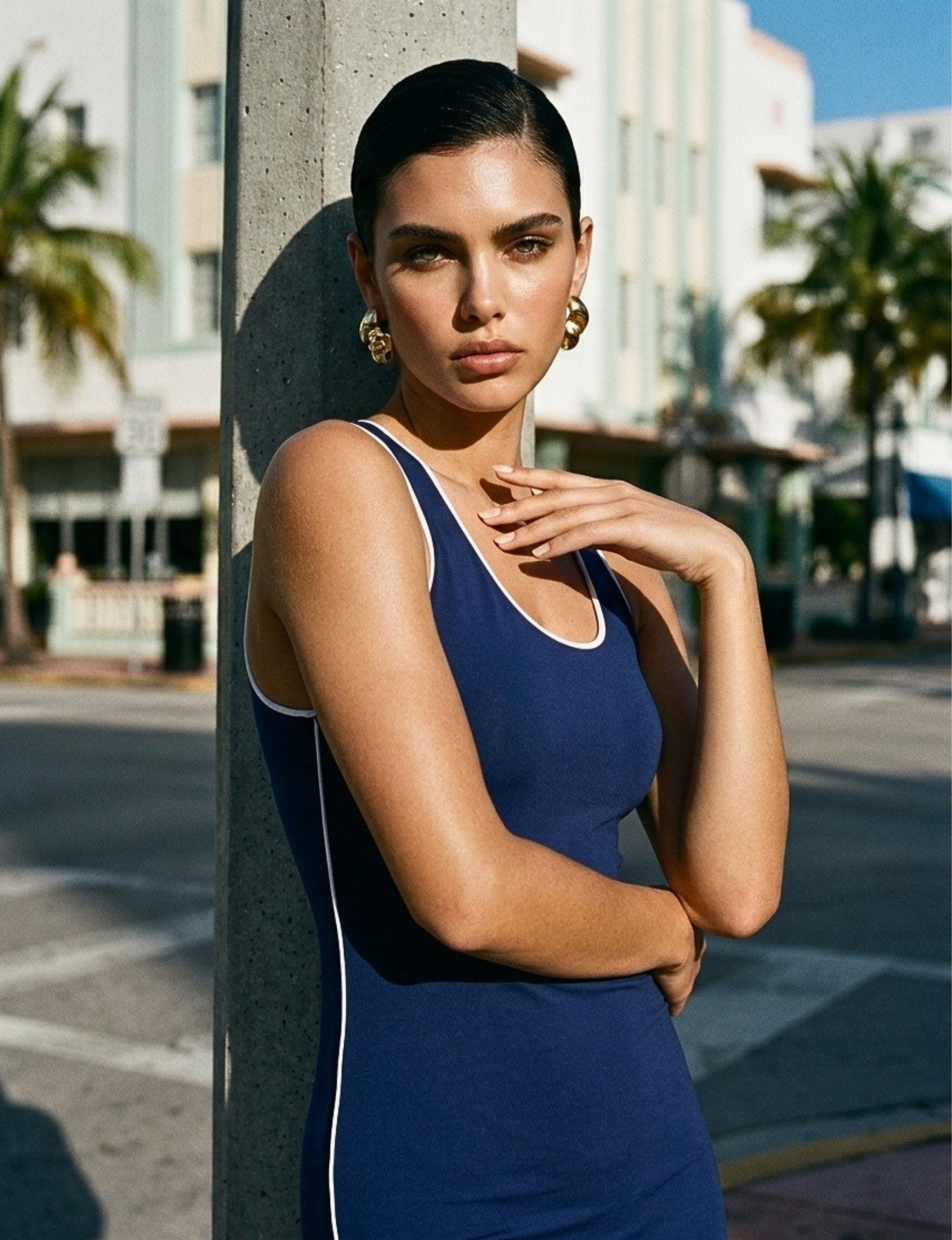 The Nubyen Triumph V-Neck Low Back Mini Dress is a luxury women’s mini dress designed with a sculpting V-neck silhouette, elegant low-back detailing, and refined minimalist tailoring. Crafted for elevated day-to-night styling, the fitted silhouette contours the body while maintaining effortless sophistication. Inspired by contemporary editorial fashion and modern femininity, this sleek black mini dress blends confidence, movement, and timeless elegance with a clean luxury aesthetic perfect for evenings, eve