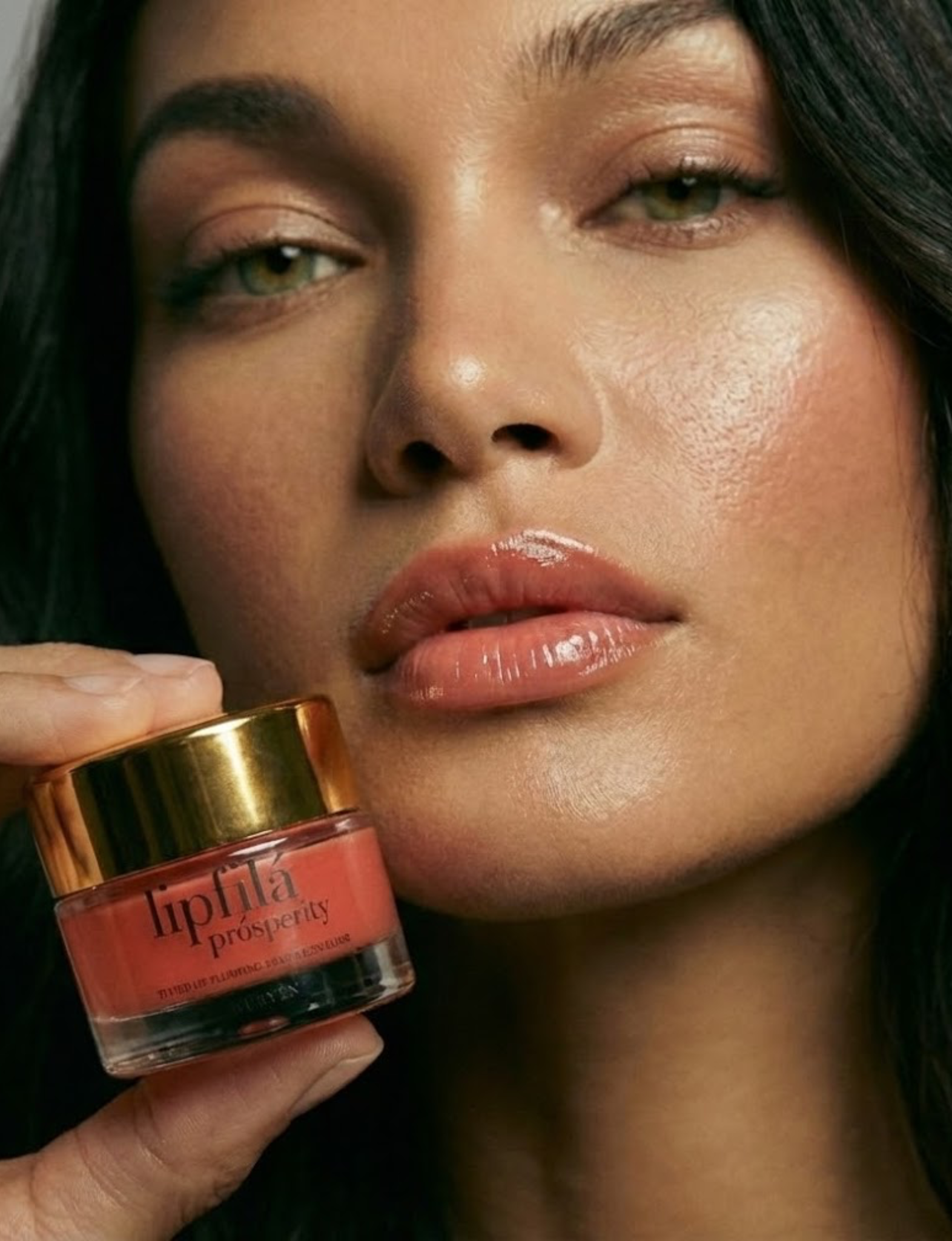 Enhance lip volume with Nubyén Lip Prosperity Tinted Plumping Balm – plant-based lip plumper with cinnamon, Reishi mushroom, lemongrass, and AHAs. Vegan, cruelty-free, recyclable, and free from parabens and sulfates. Instantly hydrates, boosts natural color, and adds a subtle tint for fuller, kissable lips