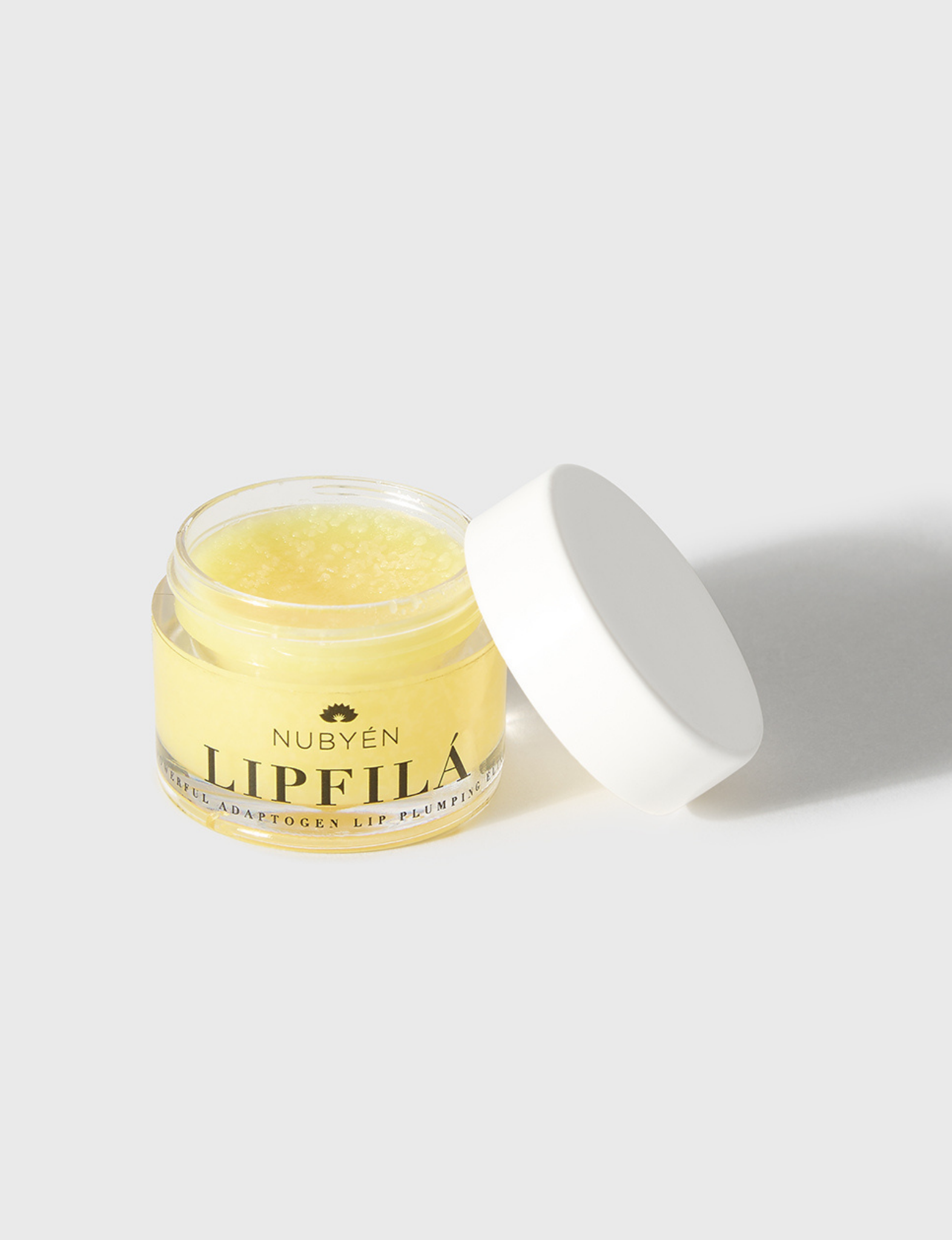 Achieve fuller lips with Nubyén Super Nudes Plumping Lipstick. Vegan, cruelty-free, moisture-matte lipstick infused with peppermint, eucalyptus, lemongrass, and collagen to enhance lip volume naturally. Available in 10 flattering nude shades, perfect for a soft, plump, kissable pout. Safe to use with or without fillers. Clean beauty formula, free of parabens, sulfates, and phthalates.