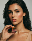 Enhance lip volume with Nubyén Lip Prosperity Tinted Plumping Balm – plant-based lip plumper with cinnamon, Reishi mushroom, lemongrass, and AHAs. Vegan, cruelty-free, recyclable, and free from parabens and sulfates. Instantly hydrates, boosts natural color, and adds a subtle tint for fuller, kissable lips