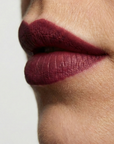 Nubyén Lip Prosperity Plumping Matte Lipstick – A luxurious matte lipstick that plumps, hydrates, and enhances lip volume naturally. Infused with nourishing ingredients like hyaluronic acid and cinnamon, it delivers bold, long-lasting color while keeping lips smooth and moisturized. 100% vegan, cruelty-free, and free from parabens and sulfates, this lipstick is perfect for fuller, healthier-looking lips. Created by medical professionals, it combines beauty and science for confident, radiant results