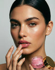 Enhance lip volume with Nubyén Lip Prosperity Tinted Plumping Balm – plant-based lip plumper with cinnamon, Reishi mushroom, lemongrass, and AHAs. Vegan, cruelty-free, recyclable, and free from parabens and sulfates. Instantly hydrates, boosts natural color, and adds a subtle tint for fuller, kissable lips
