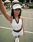 White NUBYÉN premium cotton visor featuring embroidered logo, curved brim and adjustable fit for women's luxury sportswear and everyday wear.