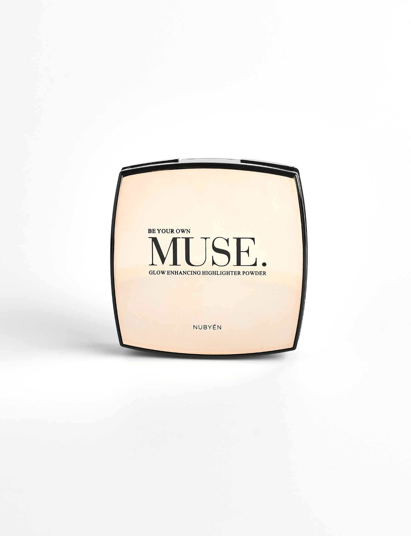 Nubyen best selling  Muse Highlighter shown in its compact, a natural radiant highlighter with papaya fruit extract that brightens the skin and delivers a seamless glow.