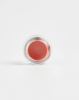 Vegan lip plumping balm by Nubyén for fuller, hydrated lips with plant-based lemongrass and AHAs. Clean, cruelty-free beauty in recyclable glass jars. Safe alternative to lip fillers with pigmented color.