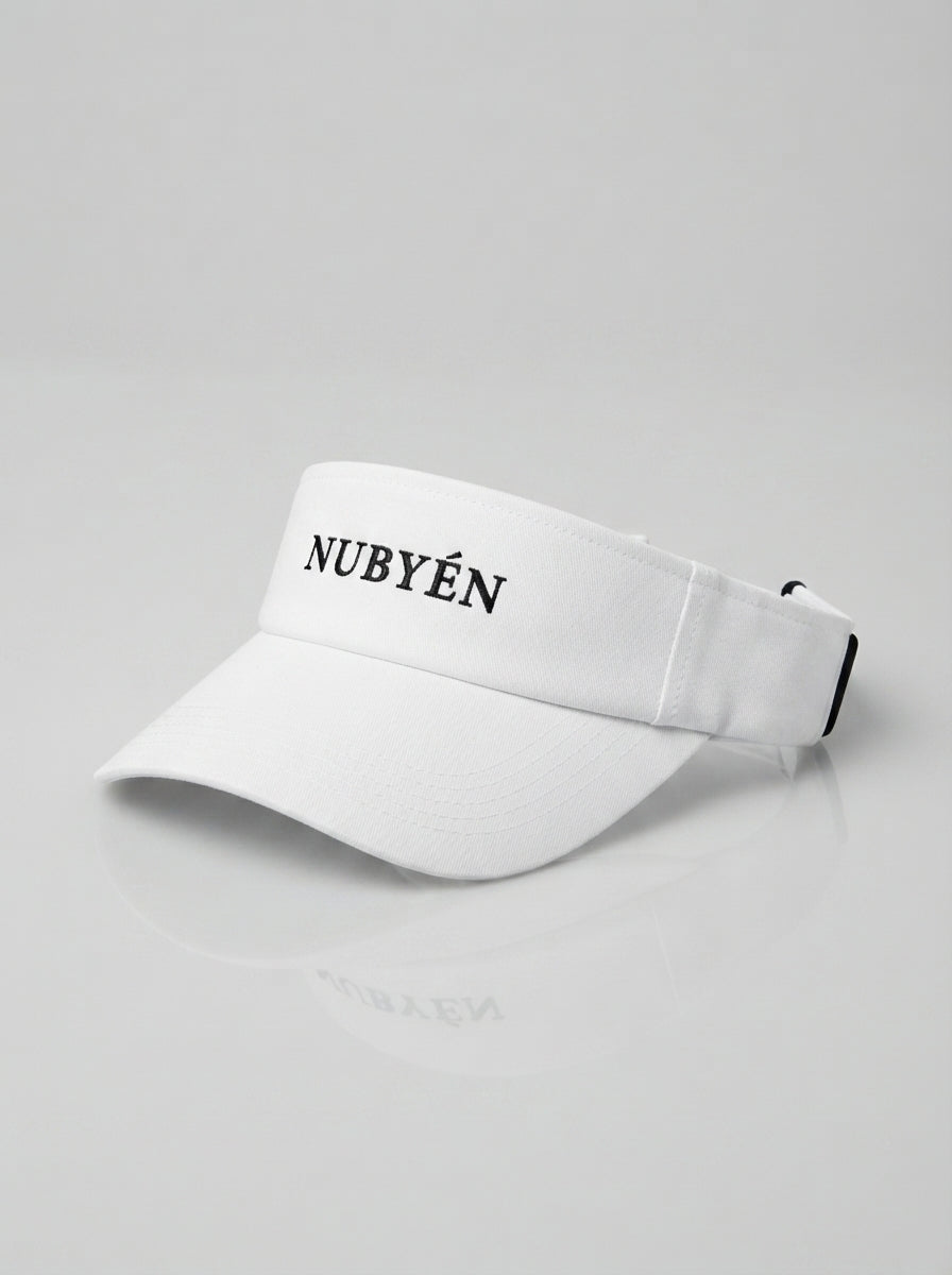 White NUBYÉN premium cotton visor featuring embroidered logo, curved brim and adjustable fit for women's luxury sportswear and everyday wear.