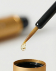 Rejuvenate and strengthen lashes and brows with Nubyén Lash + Brow Prosperity Growth Enhancer. This 100% natural serum combines Baobab, Olive Squalene, Tamanu, and Candlenut oils to repair and nourish hair follicles. Infused with rosemary and raspberry seed extracts, it rebuilds keratin bonds for fuller, thicker brows and lashes. Lightweight, fast-absorbing, and free from harsh chemicals, it's the perfect solution for safe and natural lash and brow enhancement. Pair with Restore Me Brow Pomade for ultimate 