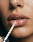 Nubyén Nude Lip Plumping Augmentation Gloss -best safe, reversible lip plumper and a natural alternative to fillers for fuller lips.Nubyen lip plumper, best lip plumper, lip plumping gloss, nubyen lip plumping balm, lip plumping balm, This Lip plumping gloss Nubyen Nude, its our best selling vegan and cruelty free gloss for fuller lips instantly, has natural ingredients such as collagen & hyaluronic acid, best lip plumping lipgloss, best lip plumper, lip filler, full lips, lip injections, to faced lip