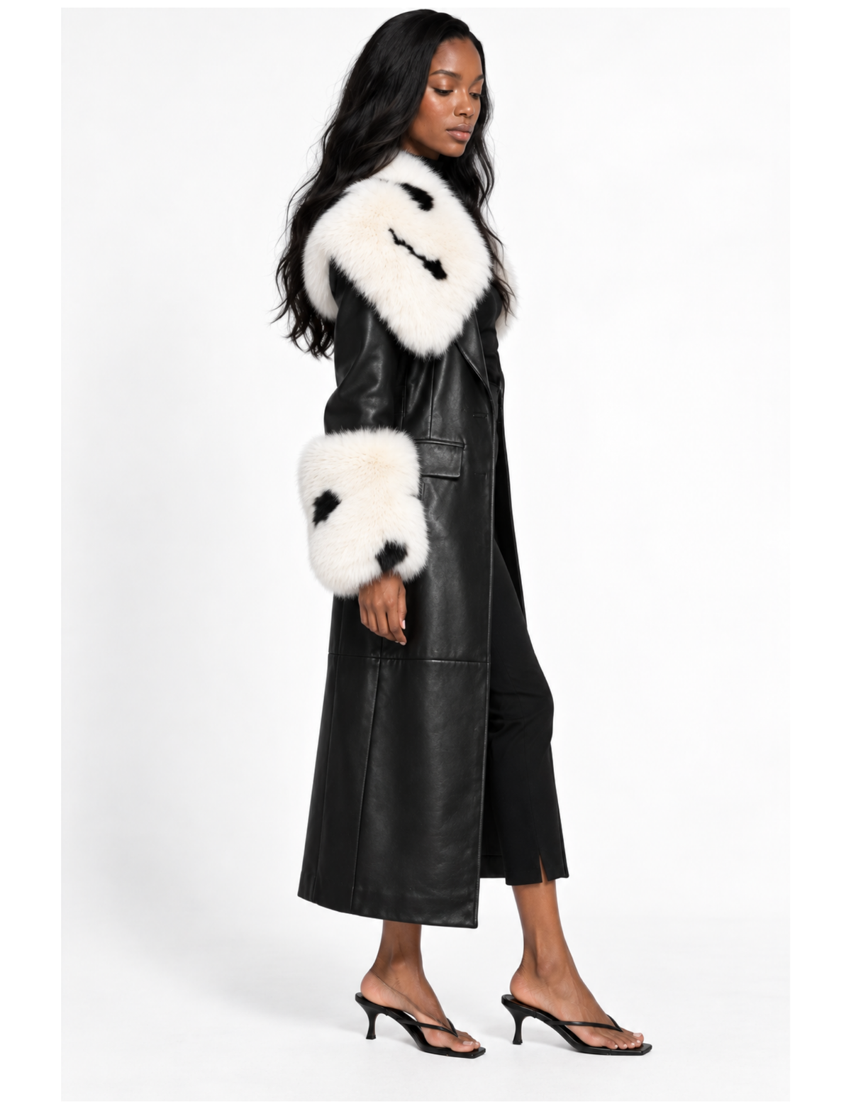 Black mid-length trench coat with a dramatic fluffy cream fur collar.