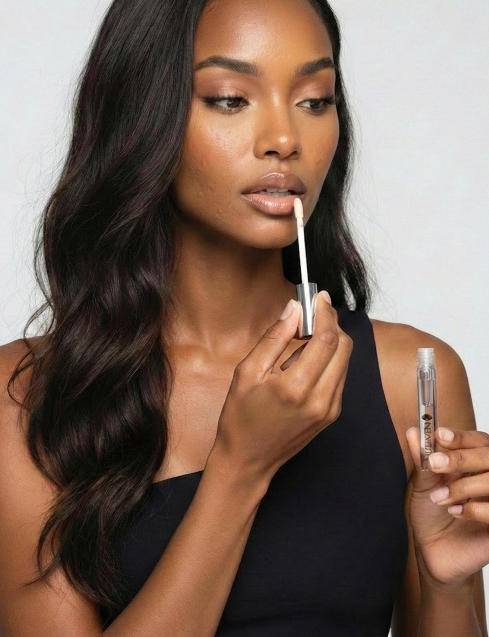 Nubyén Nude Lip Plumping Augmentation Gloss -best safe, reversible lip plumper and a natural alternative to fillers for fuller lips.