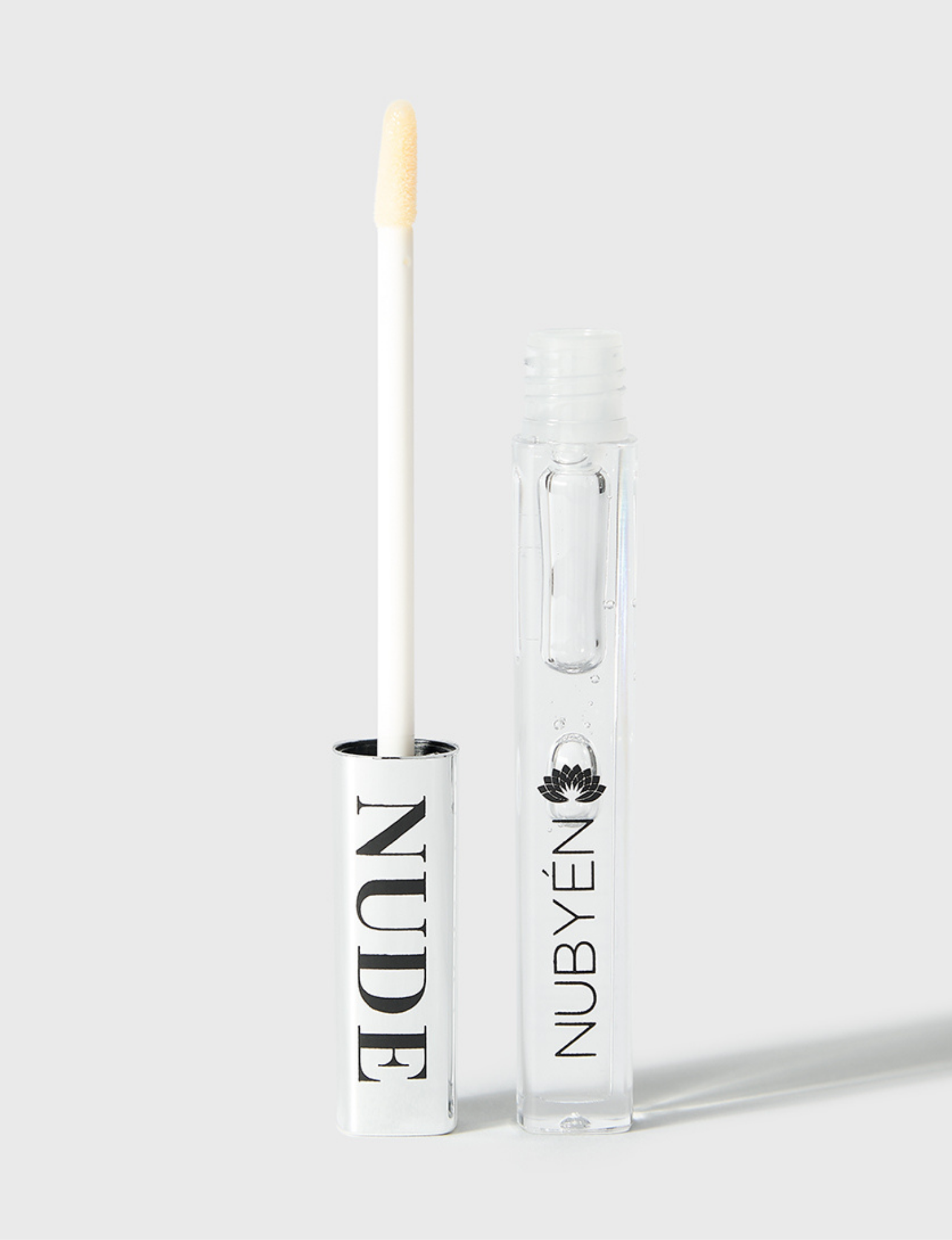 Nubyén Nude Lip Plumping Augmentation Gloss -best safe, reversible lip plumper and a natural alternative to fillers for fuller lips.Nubyen lip plumper, best lip plumper, lip plumping gloss, nubyen lip plumping balm, lip plumping balm, This Lip plumping gloss Nubyen Nude, its our best selling vegan and cruelty free gloss for fuller lips instantly, has natural ingredients such as collagen & hyaluronic acid, best lip plumping lipgloss, best lip plumper, lip filler, full lips, lip injections, to faced lip