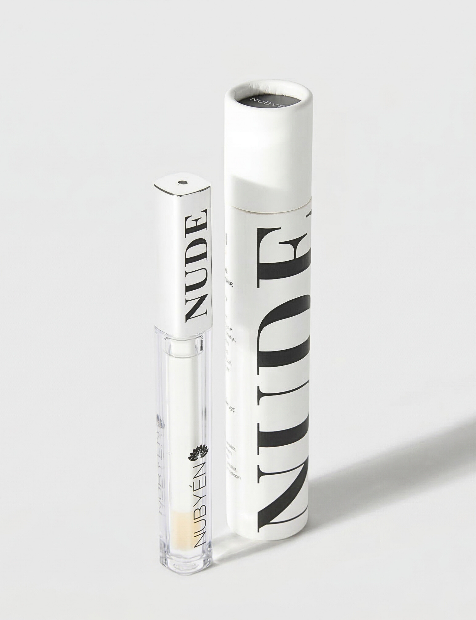 Nubyén Nude Lip Plumping Augmentation Gloss -best safe, reversible lip plumper and a natural alternative to fillers for fuller lips.Nubyen lip plumper, best lip plumper, lip plumping gloss, nubyen lip plumping balm, lip plumping balm, This Lip plumping gloss Nubyen Nude, its our best selling vegan and cruelty free gloss for fuller lips instantly, has natural ingredients such as collagen & hyaluronic acid, best lip plumping lipgloss, best lip plumper, lip filler, full lips, lip injections, to faced lip