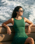 The Nubyen Radiance Flared Tennis Dress is a luxury women’s tennis dress designed with a sculpting fitted bodice, elegant flared skirt silhouette, and premium performance fabric for effortless movement and elevated court style. Inspired by contemporary racket sports fashion and minimalist wellness aesthetics, this modern activewear dress blends feminine tailoring with functional comfort for tennis, padel, pilates, and luxury everyday wear. The streamlined silhouette enhances confidence while delivering refi