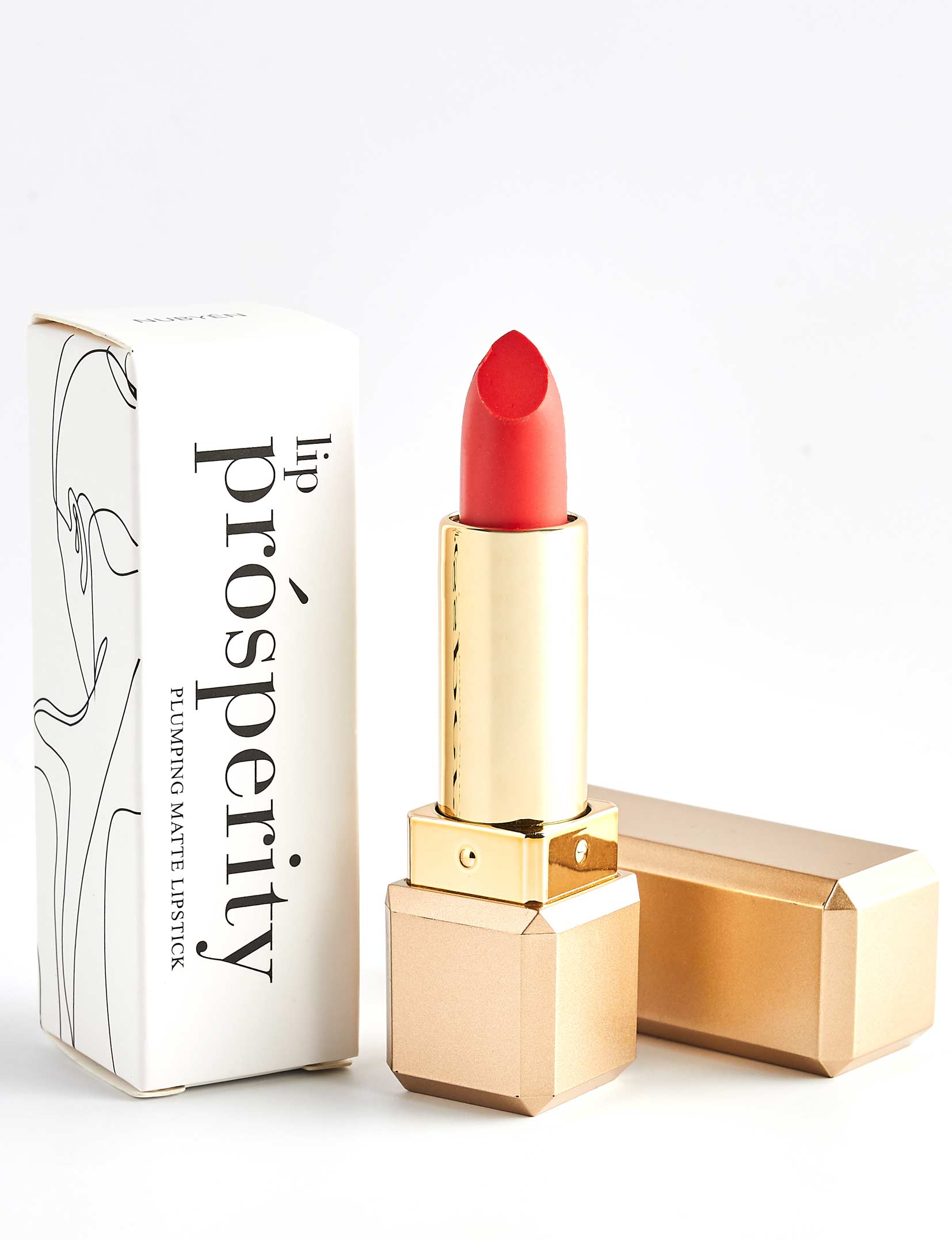 Nubyén Lip Prosperity Plumping Matte Lipstick – A luxurious matte lipstick that plumps, hydrates, and enhances lip volume naturally. Infused with nourishing ingredients like hyaluronic acid and cinnamon, it delivers bold, long-lasting color while keeping lips smooth and moisturized. 100% vegan, cruelty-free, and free from parabens and sulfates, this lipstick is perfect for fuller, healthier-looking lips. Created by medical professionals, it combines beauty and science for confident, radiant results