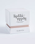 Experience visibly fuller lips with Nubyen Lip Filá+ Adaptogen Plumping Balm. Enriched with natural menthol, cinnamon, marine algae collagen, and hyaluronic acid for hydration, volume, and a plump, smooth finish. Vegan, cruelty-free, and clean beauty formula free of parabens, sulfates, and phthalates. Suitable for use with or without lip fillers. Achieve a naturally enhanced pout effortlessly