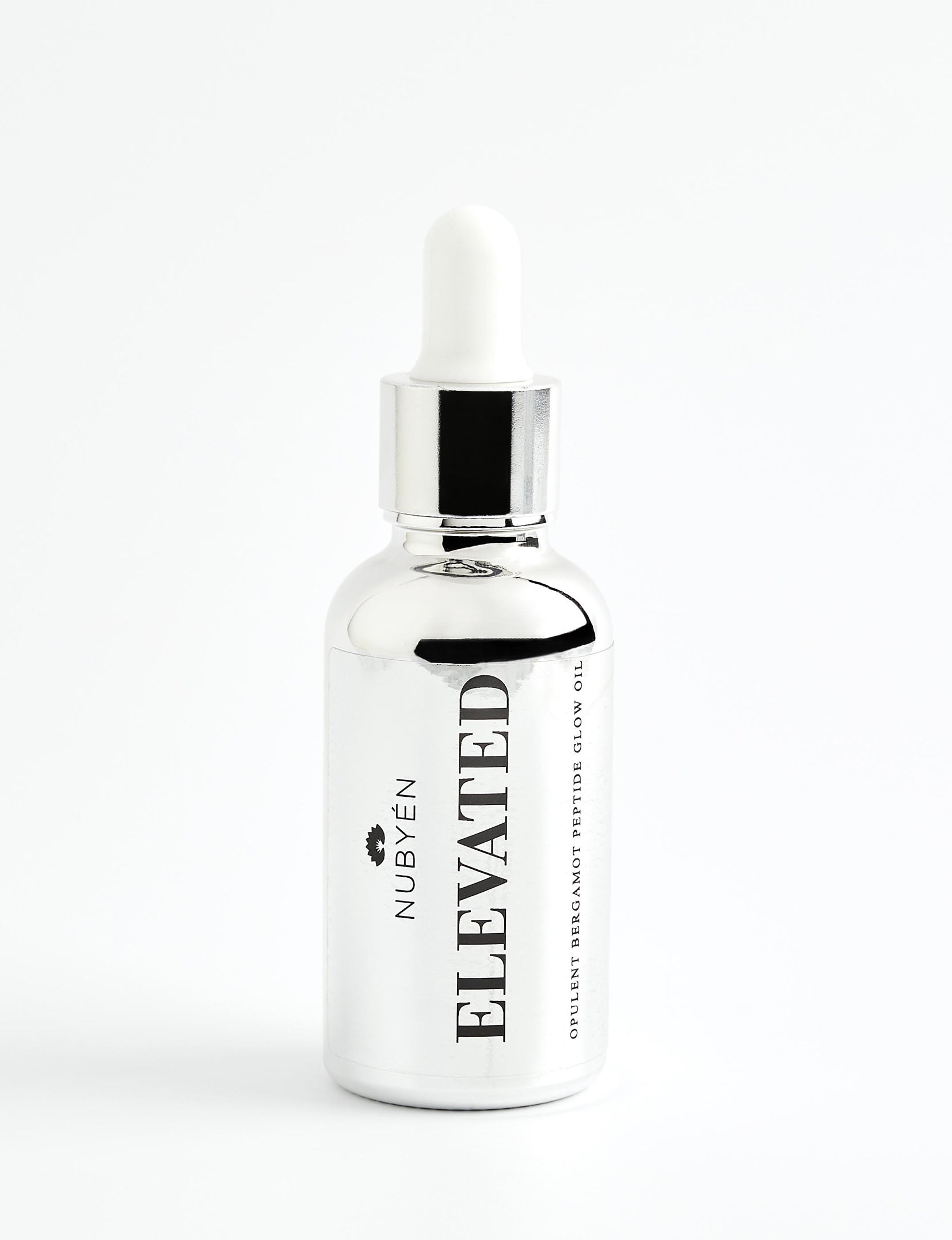 Discover Nubyén Elevated Mood Oil, a hydrating face oil packed with natural ingredients like Camellia Oil, Avocado, Squalene, and Bergamot. This 100% natural, vegan, and cruelty-free formula deeply nourishes, hydrates, and brightens your skin while improving elasticity and reducing wrinkles. Perfect for all skin types, it also enhances your mood with its uplifting scent. Free from sulfates, phthalates, and parabens, this multi-functional oil can also be used for hair, lashes, and brows.