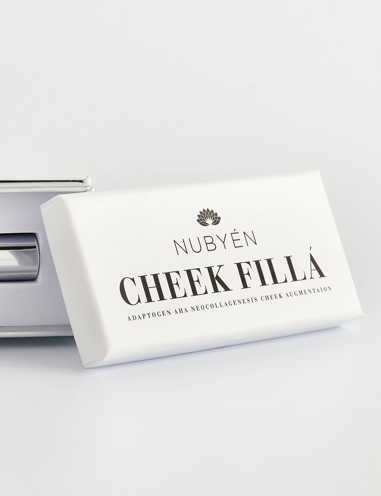 Enhance your cheekbones naturally with Nubyen Cheek Fillá, a clean, vegan cheek-lifting elixir enriched with hyaluronic acid, cinnamon, and AHA fruit extracts for hydration, plumping, and brightening. Perfect for sculpted, radiant cheeks without injections. Eco-friendly glass packaging.