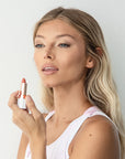 Achieve fuller lips with Nubyén Super Nudes Plumping Lipstick. Vegan, cruelty-free, moisture-matte lipstick infused with peppermint, eucalyptus, lemongrass, and collagen to enhance lip volume naturally. Available in 10 flattering nude shades, perfect for a soft, plump, kissable pout. Safe to use with or without fillers. Clean beauty formula, free of parabens, sulfates, and phthalates.